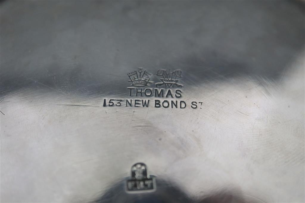 A late Victorian embossed silver presentation punch bowl, by Thomas of New Bond Street, London, 1890,